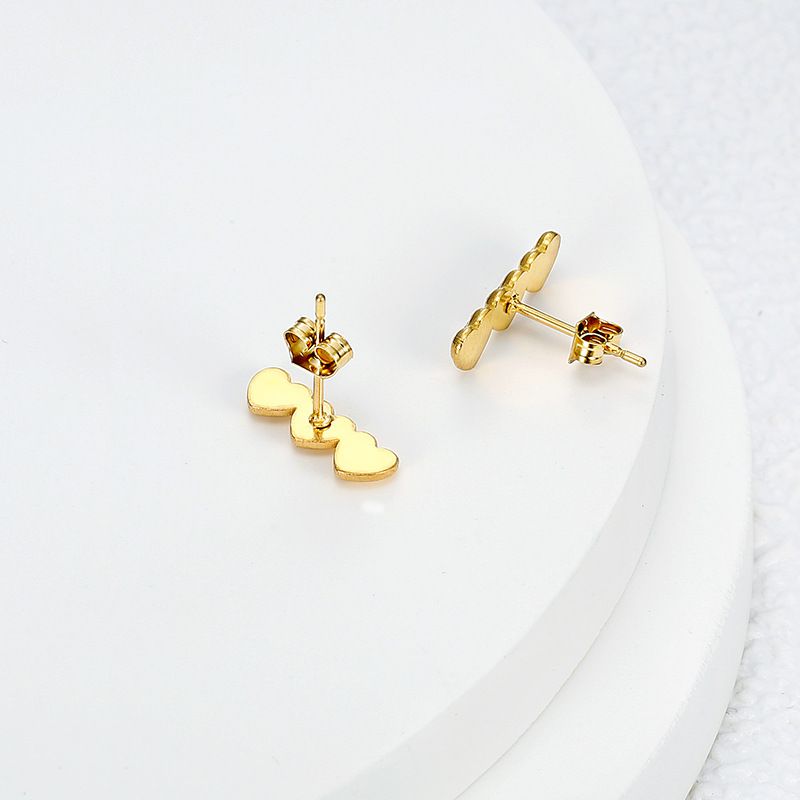Women's Titanium Steel Heart Golden Peach Stud Earrings | EaseWholesale 1